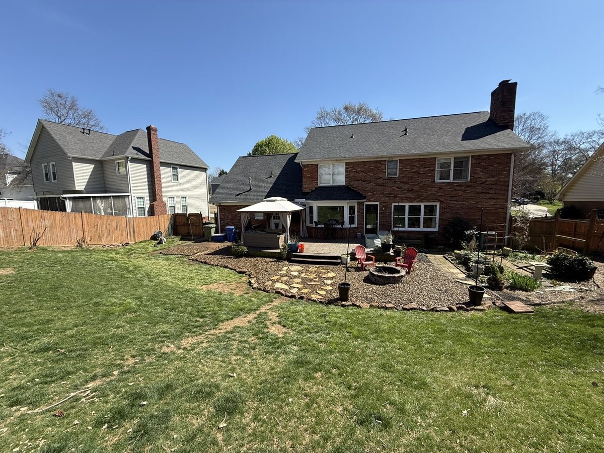 River rock drainage solution installed by Iron Lungs — Greenville SC erosion control