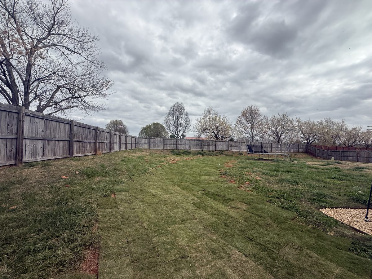 After drainage grading and sod replacement — resloped and graded for proper drainage Greenville SC